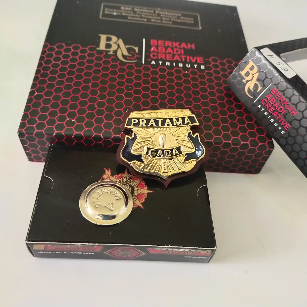 Foto Pin Satpam Gada Pratama